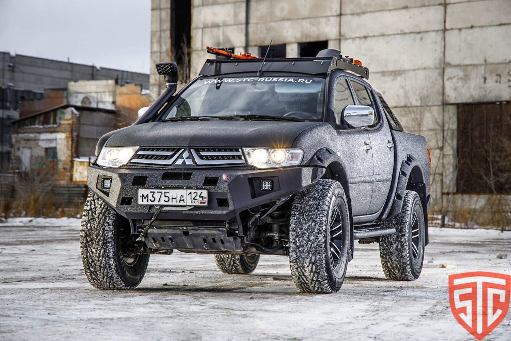 Бампер передний Mitsubishi Pajero Sport 2008-2015/L200 2013-2015 REVO